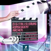 Filmklappe mit den Worten: Digitalisierung konsequent machen